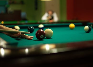 Pool table with balls on it