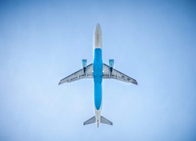 Underside of a commercial jet in the air