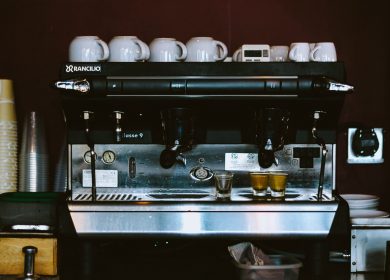 Espresso machine with cups on top