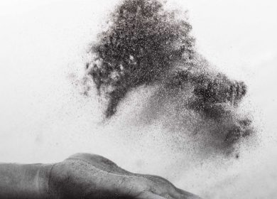 Hand below powder in th air