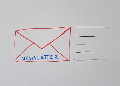Drawing of envelope moving left with the word "Newsletter" on it